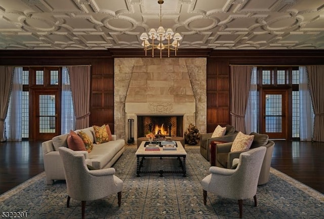 41 Abby Rd, Peapack Gladstone Boro, NJ 07977 - living area featuring an ornate ceiling, a chandelier, crown molding, wood finished floors, and a fireplace