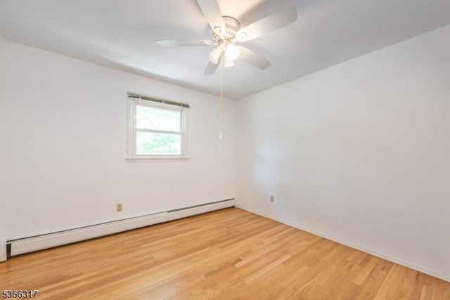 34 Copperfield Rd, Scotch Plains Twp, NJ 07076 - spare room with a baseboard heating unit, wood finished floors, and ceiling fan
