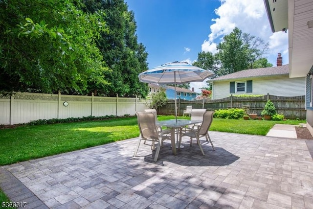 34 Copperfield Rd, Scotch Plains Twp, NJ 07076 - fenced backyard featuring a patio area and outdoor dining area