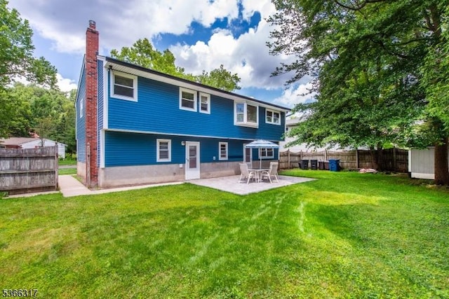 34 Copperfield Rd, Scotch Plains Twp, NJ 07076 - rear view of property with a chimney and a patio area