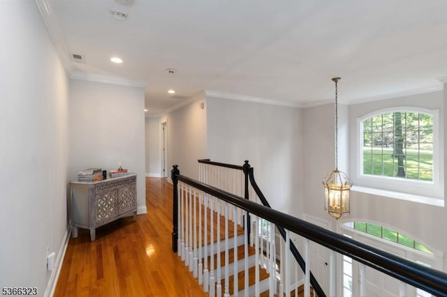 8 Forest Dr, Morris Twp, NJ 07960 - hall with an upstairs landing, a chandelier, ornamental molding, wood finished floors, and recessed lighting