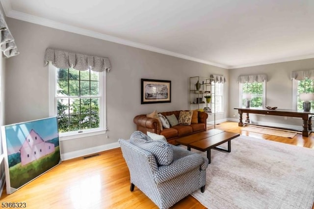 8 Forest Dr, Morris Twp, NJ 07960 - living room featuring healthy amount of natural light, wood finished floors, and ornamental molding