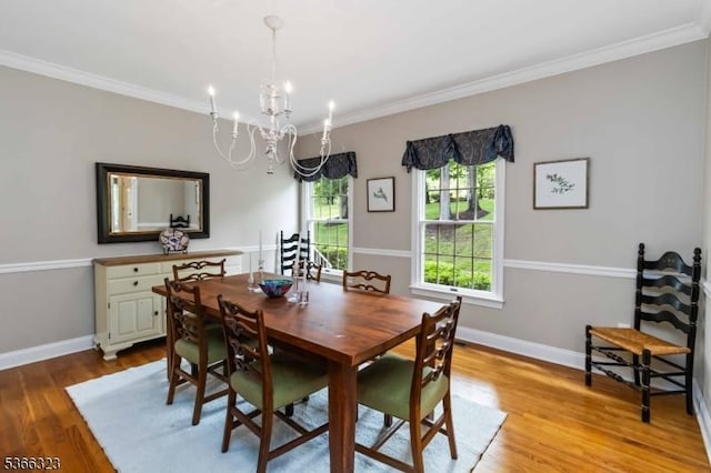 8 Forest Dr, Morris Twp, NJ 07960 - dining room with crown molding, a chandelier, and light wood-style floors