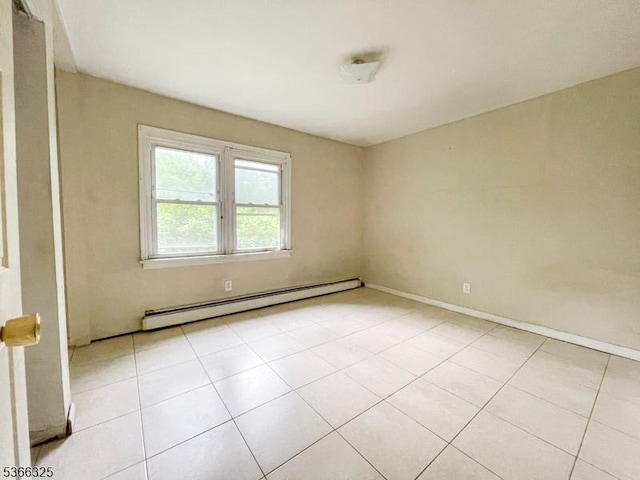 208 Fayette Ave, Wayne Twp, NJ 07470 - empty room featuring baseboard heating and light tile patterned floors