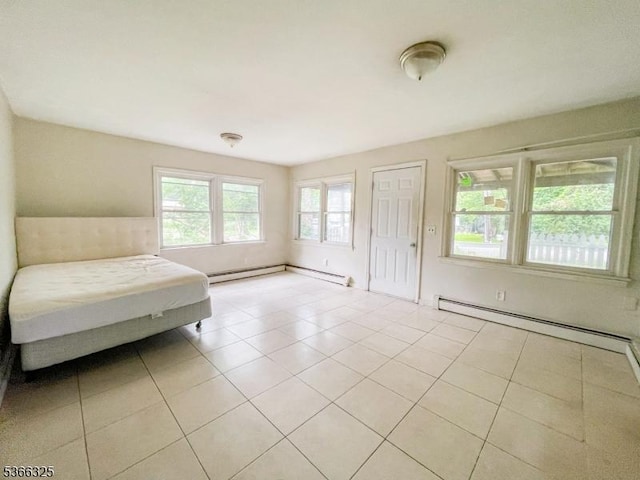 208 Fayette Ave, Wayne Twp, NJ 07470 - bedroom featuring light tile patterned floors, a baseboard radiator, and baseboard heating