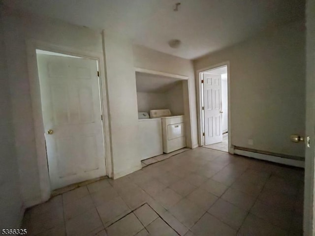 208 Fayette Ave, Wayne Twp, NJ 07470 - washroom with washer and dryer and baseboard heating