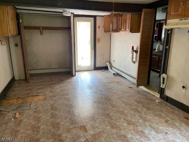 196 Rockport Rd, Mansfield Twp, NJ 07865 - kitchen featuring a baseboard heating unit, brown cabinets, and brick patterned floors