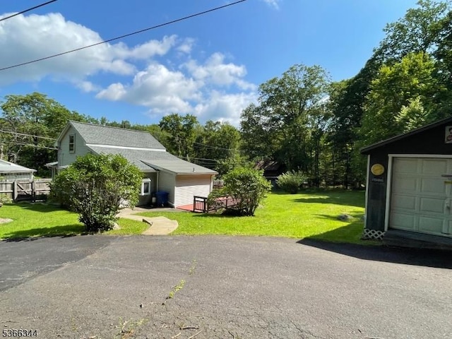 196 Rockport Rd, Mansfield Twp, NJ 07865 - view of property exterior featuring a yard