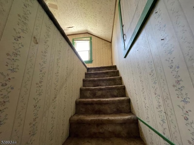 196 Rockport Rd, Mansfield Twp, NJ 07865 - stairway with vaulted ceiling and a textured ceiling