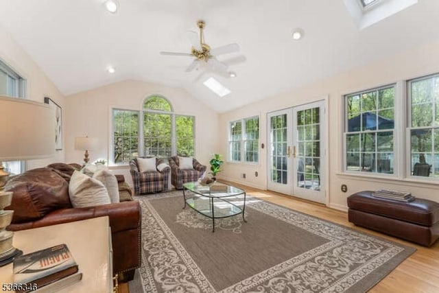 1 Craig Rd, Clinton Twp, NJ 08801 - living room with a skylight, a ceiling fan, wood finished floors, vaulted ceiling, and french doors