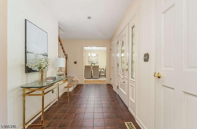 1 Craig Rd, Clinton Twp, NJ 08801 - entrance foyer with stairs and dark tile patterned flooring