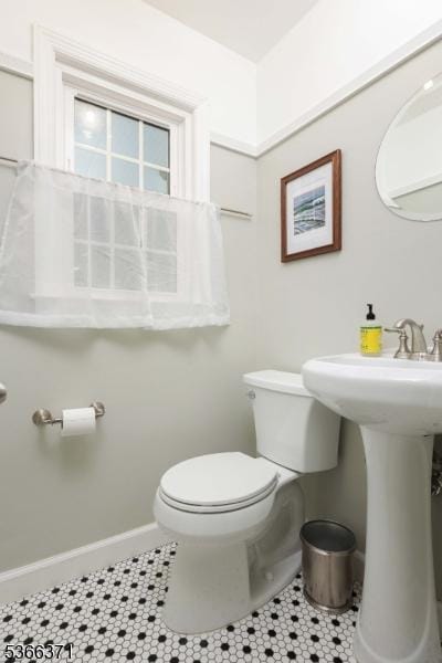 924 Maurice Ave, Rahway City, NJ 07065 - bathroom with toilet and tile patterned flooring