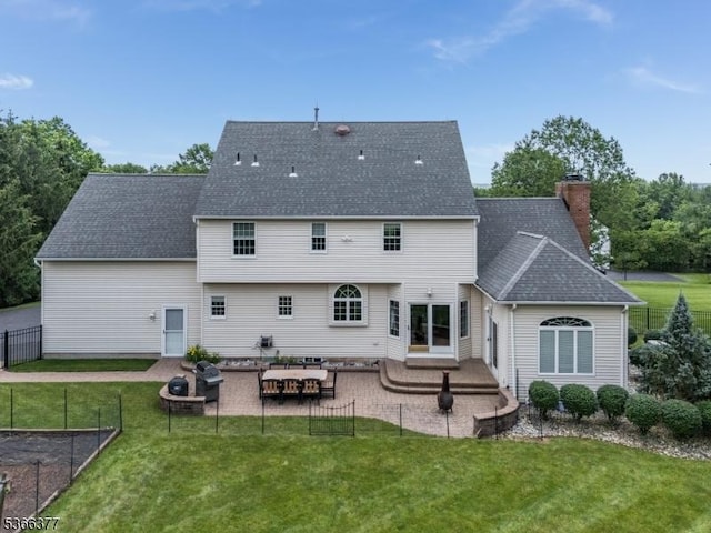 4 Coryell Ct, Raritan Twp, NJ 08822 - rear view of house with a fire pit, a chimney, a patio area, and roof with shingles