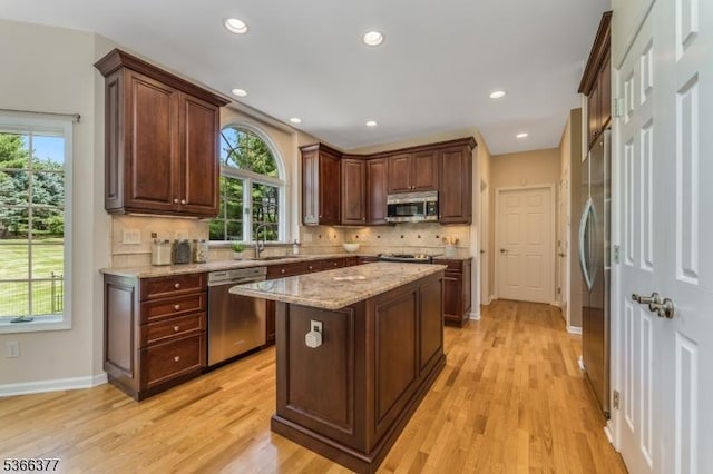 4 Coryell Ct, Raritan Twp, NJ 08822 - kitchen with stainless steel appliances, light wood finished floors, plenty of natural light, and recessed lighting