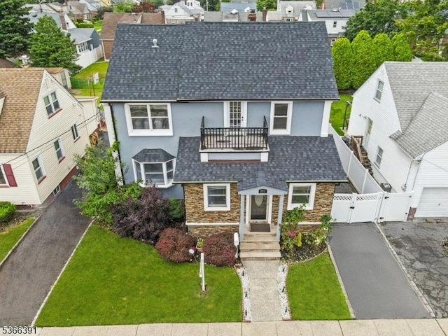 980 Moessner Ave, Union Twp, NJ 07083 - view of front facade featuring a gate, stucco siding, stone siding, and a balcony