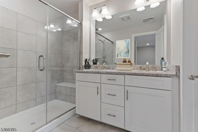 26 Gerhard, Morris Twp, NJ 07960 - bathroom with double vanity, a shower stall, and tile patterned flooring