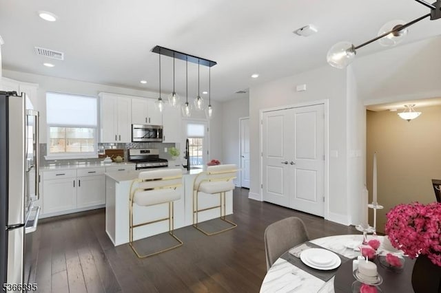 26 Gerhard, Morris Twp, NJ 07960 - kitchen featuring stainless steel appliances, light countertops, white cabinetry, dark wood-style floors, and recessed lighting