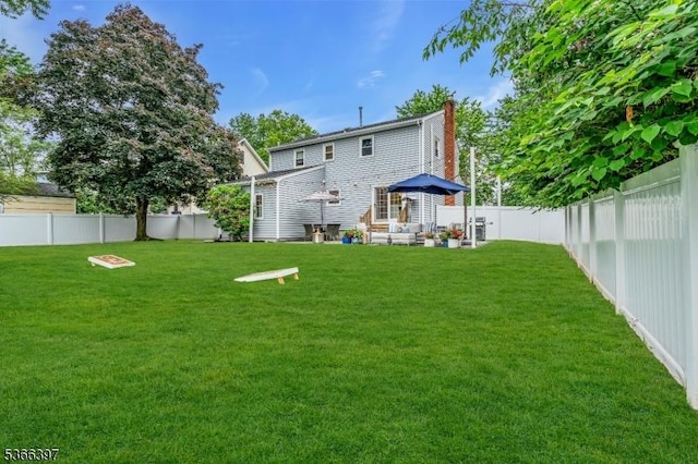 913 Columbus Ave, Westfield Town, NJ 07090 - rear view of property with a chimney and a fenced backyard