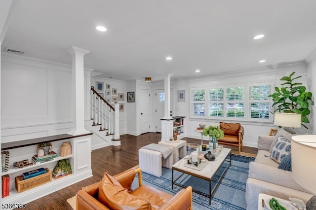 913 Columbus Ave, Westfield Town, NJ 07090 - living area featuring decorative columns, stairway, dark wood finished floors, recessed lighting, and crown molding