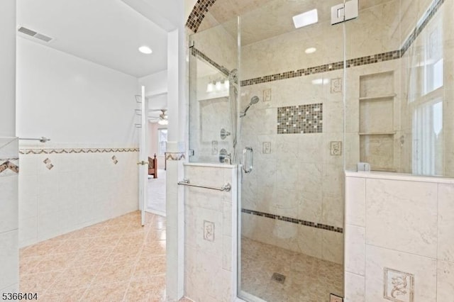 88 San Antonio Ave, Nutley Twp, NJ 07110 - bathroom featuring tile walls, a stall shower, a ceiling fan, and recessed lighting