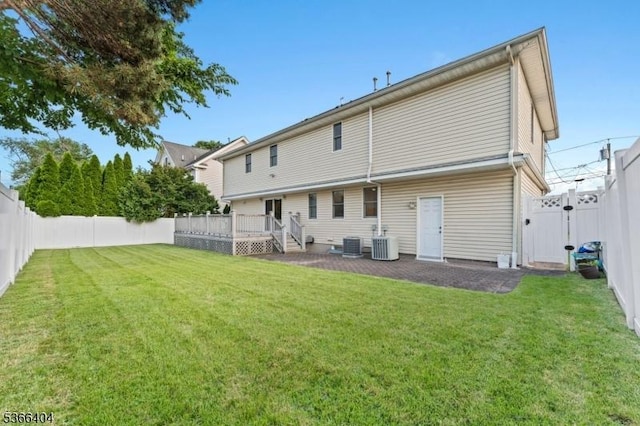 88 San Antonio Ave, Nutley Twp, NJ 07110 - rear view of property with a fenced backyard, a wooden deck, a patio area, and a gate