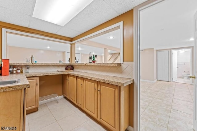 88 San Antonio Ave, Nutley Twp, NJ 07110 - kitchen featuring tasteful backsplash, light countertops, and light tile patterned flooring