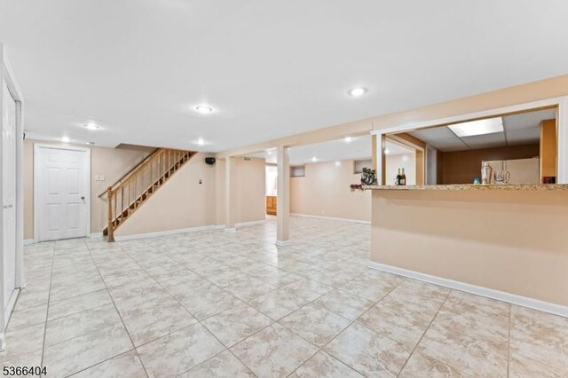 88 San Antonio Ave, Nutley Twp, NJ 07110 - unfurnished living room with stairs, light tile patterned floors, and recessed lighting