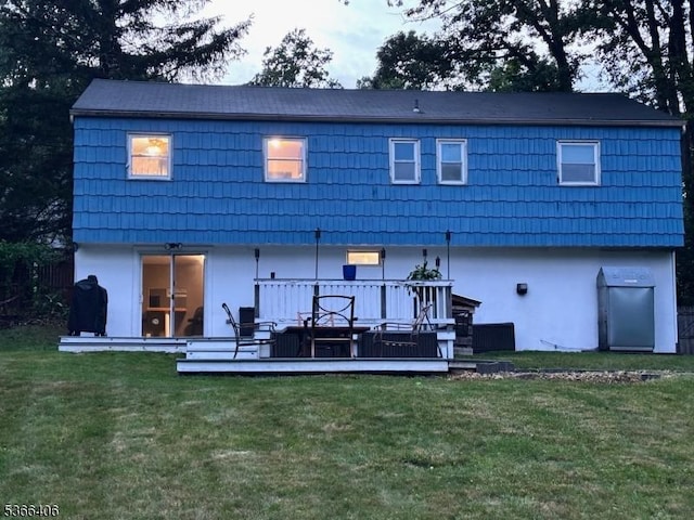 17 Frances Ave, Hopatcong Boro, NJ 07874 - back of house with a wooden deck, stucco siding, and a lawn