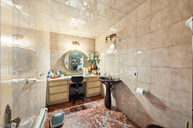 444 Harrison Ave, Lodi Boro, NJ 07644 - bathroom with tile walls, marble tiled floors, and a baseboard heating unit