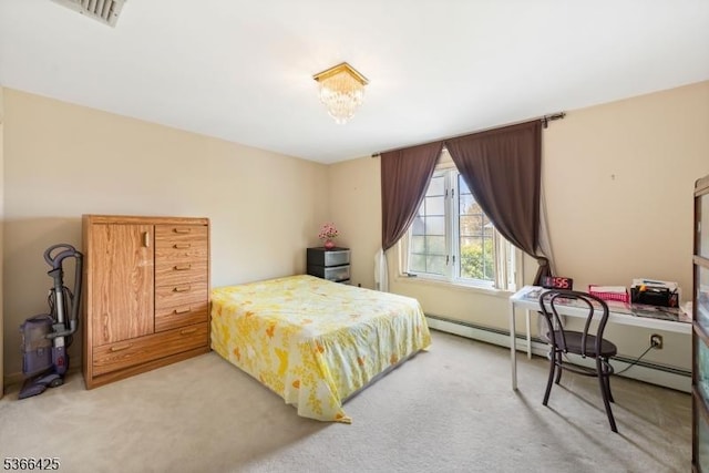 444 Harrison Ave, Lodi Boro, NJ 07644 - bedroom with light colored carpet, a desk, and a baseboard radiator