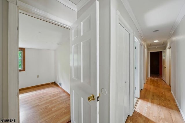 240 Free Union Rd, Liberty Twp, NJ 07838 - corridor with light wood finished floors, attic access, and ornamental molding