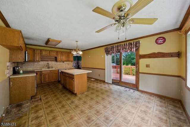 240 Free Union Rd, Liberty Twp, NJ 07838 - kitchen with light countertops, stainless steel appliances, brown cabinetry, ornamental molding, and backsplash