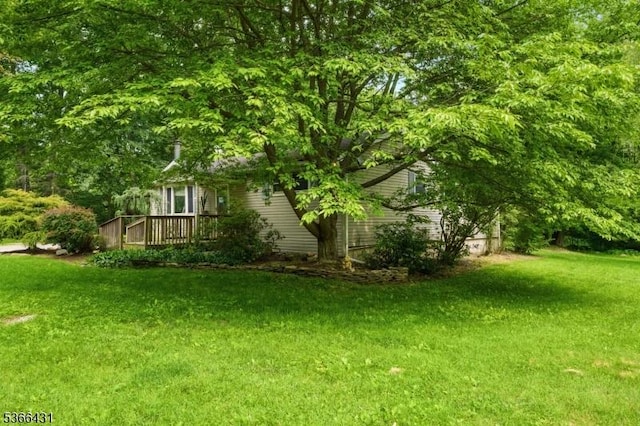 240 Free Union Rd, Liberty Twp, NJ 07838 - view of green lawn with a wooden deck