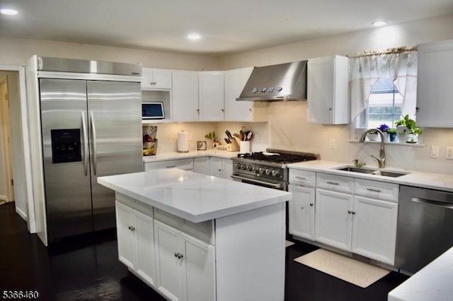 710 County Road 513, Alexandria Twp, NJ 08867 - kitchen featuring stainless steel appliances, wall chimney exhaust hood, white cabinets, a kitchen island, and light countertops