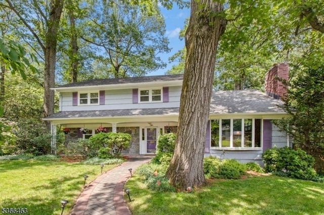 10 Cross Way, New Providence Boro, NJ 07974 - view of front of home with a front yard and a chimney