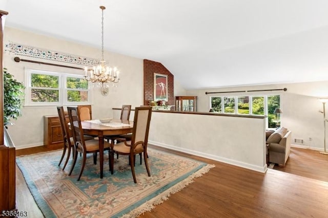 10 Cross Way, New Providence Boro, NJ 07974 - dining room featuring wood finished floors, a chandelier, healthy amount of natural light, and vaulted ceiling