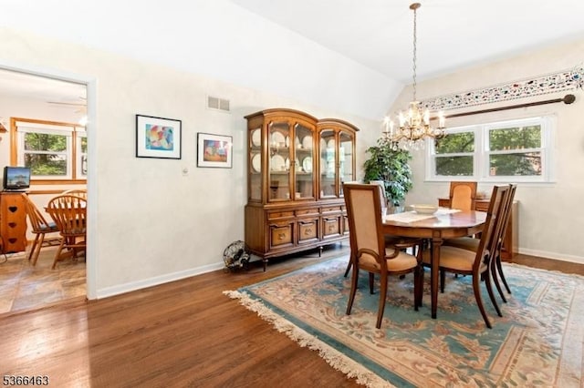 10 Cross Way, New Providence Boro, NJ 07974 - dining area with a chandelier, wood finished floors, and vaulted ceiling