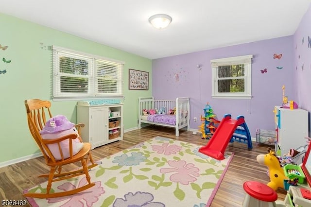 10 Cross Way, New Providence Boro, NJ 07974 - bedroom featuring wood finished floors and a crib