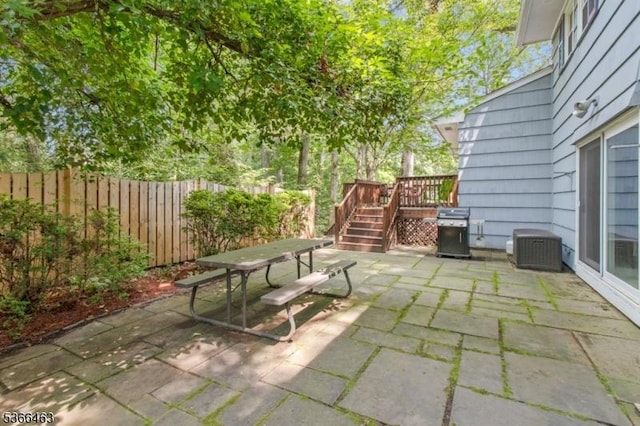 10 Cross Way, New Providence Boro, NJ 07974 - view of patio featuring grilling area, outdoor dining space, a deck, and stairway
