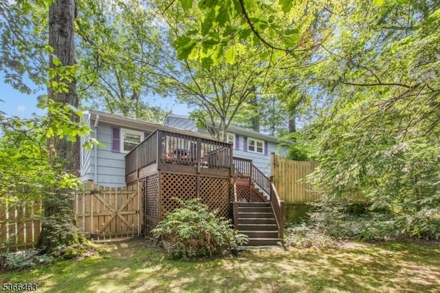 10 Cross Way, New Providence Boro, NJ 07974 - rear view of property with stairs and a wooden deck