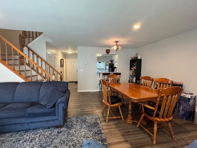 337 Smithwold Rd, Franklin Twp, NJ 08873 - dining area featuring wood finished floors, stairway, and a chandelier