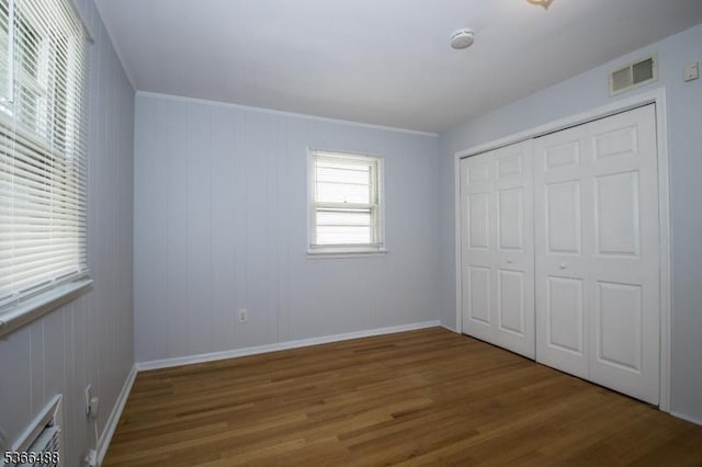 219 Magie Ave, Roselle Park Boro, NJ 07204 - unfurnished bedroom featuring wood finished floors and a closet