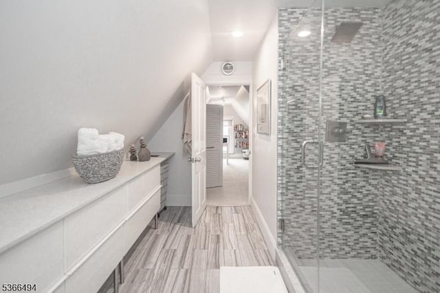 151 N Union St Unit 6, Lambertville City, NJ 08530 - bathroom featuring vaulted ceiling, a stall shower, and vanity