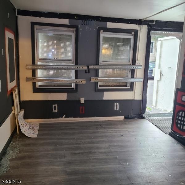471 S 16th St, Newark City, NJ 07103 - spare room featuring wood-type flooring and plenty of natural light