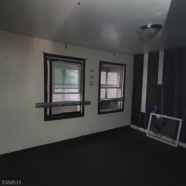 471 S 16th St, Newark City, NJ 07103 - unfurnished room with dark carpet