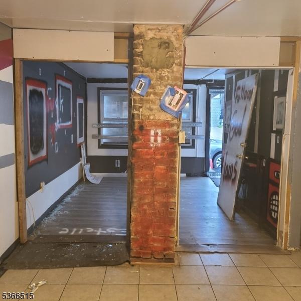 471 S 16th St, Newark City, NJ 07103 - corridor with tile patterned flooring