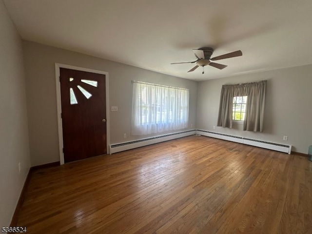 39 Green St, Oxford Twp, NJ 07863 - entryway featuring a baseboard radiator, wood finished floors, and a ceiling fan