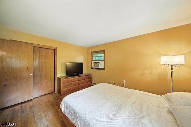 54 Pine Ln, West Milford Twp, NJ 07480 - bedroom featuring wood finished floors, a closet, and cooling unit