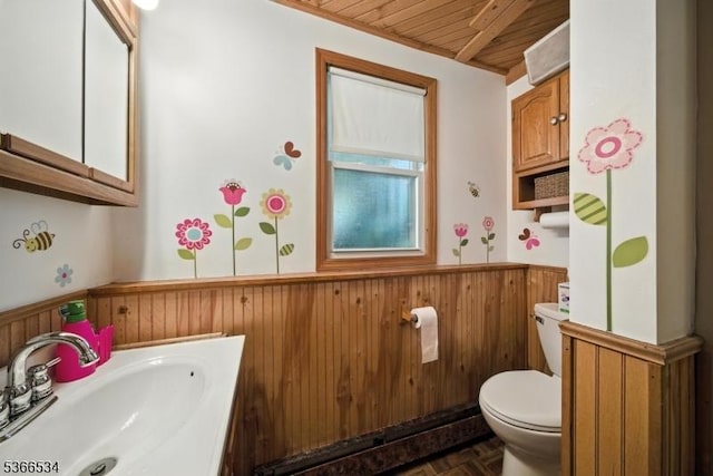 54 Pine Ln, West Milford Twp, NJ 07480 - bathroom with a wainscoted wall, wood ceiling, vanity, wood walls, and baseboard heating