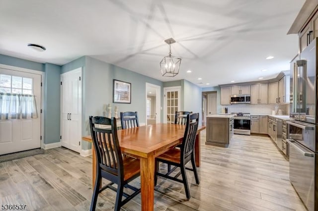 19 Mountain Ridge Dr, Wayne Twp, NJ 07470 - dining space with light wood-style flooring, a chandelier, and recessed lighting